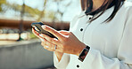 Outdoor, hands and business person with smartphone for travel map, location and chat on social media. Closeup, employee and digital with mobile for application, navigation and text message to contact