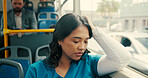 Tired nurse, woman and sleeping on bus for travel journey, shift burnout and healthcare fatigue. Morning commute, health professional and exhausted on public transport with nap, city traffic and rest