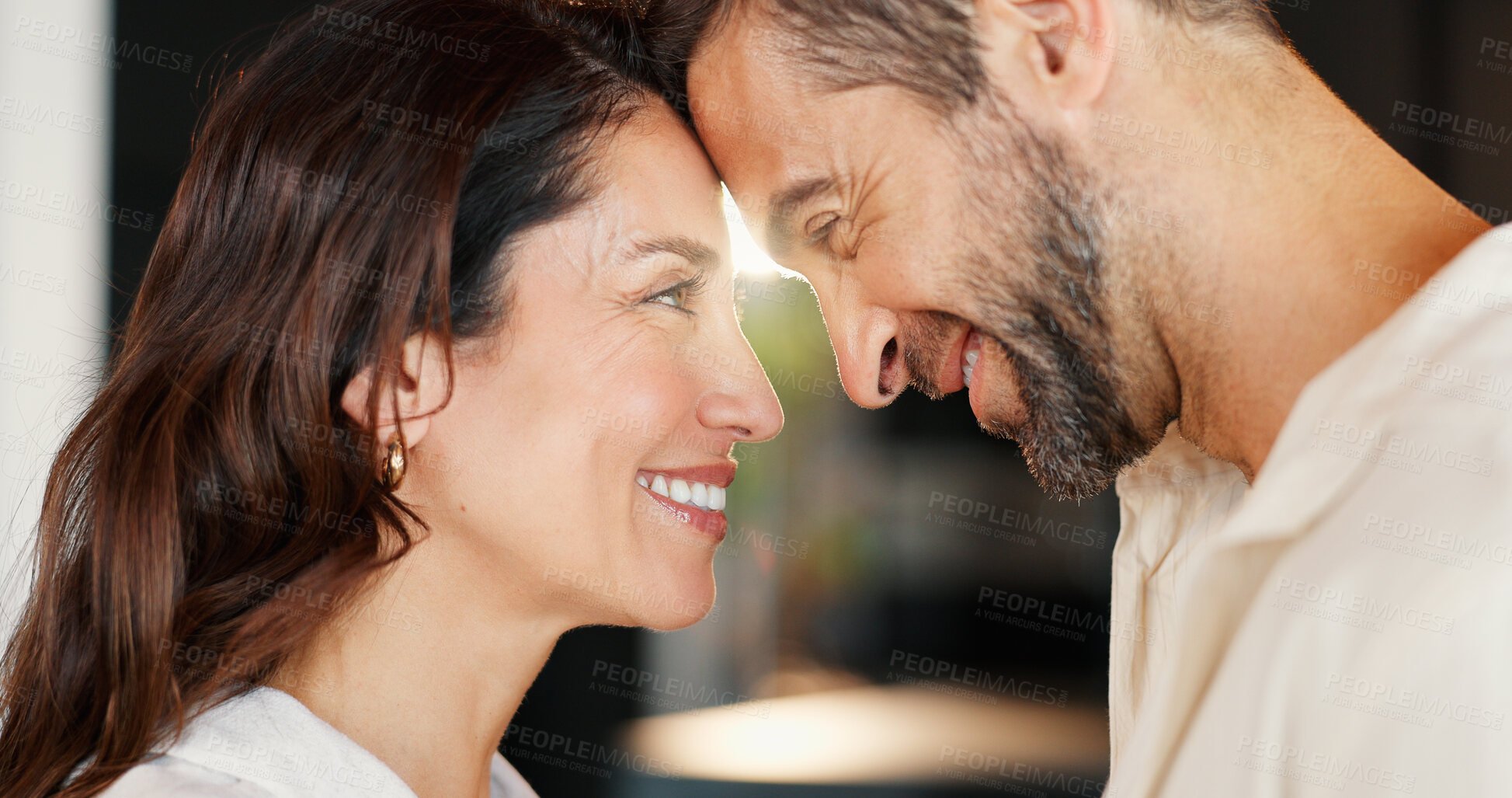 Buy stock photo Connection, happy and couple in home with care, bonding and forehead touch in morning for greeting. Love, romantic and man with woman for support, safety and commitment in marriage in house together.
