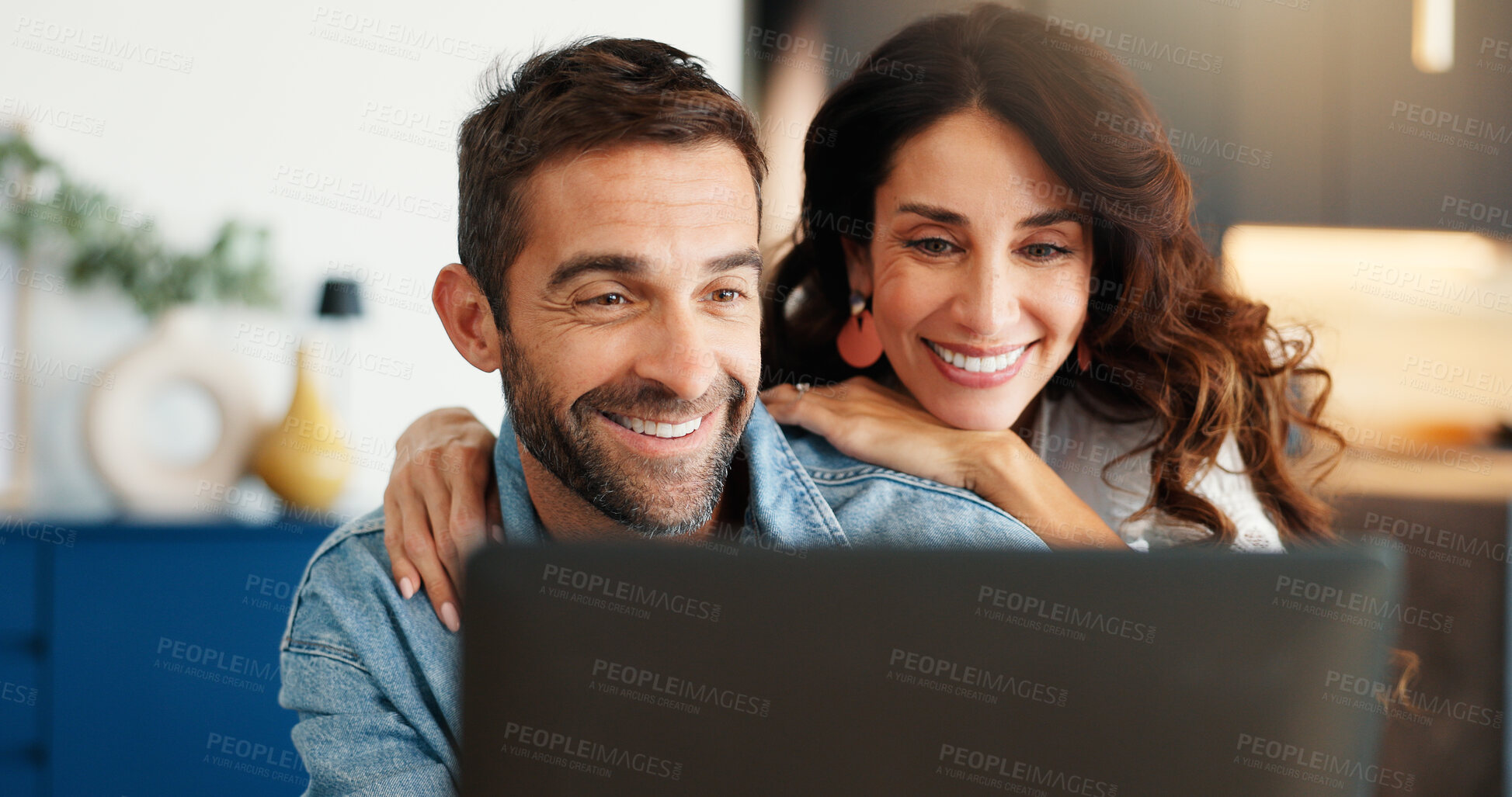 Buy stock photo Laptop, happy and couple in home for research with vacation, holiday or weekend planning. Love, smile and man with woman on computer for marriage anniversary getaway with booking flight in house.