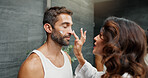 Skincare, couple or face cream cosmetics in bathroom for skin hydration, morning routine or getting ready. Love, people or product application for sunscreen, dermatology support or anti aging in home