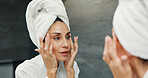 Skincare, beauty and woman in bathroom for natural, moisturizing and morning routine in home. Cosmetic, wellness and female person by mirror for facial dermatology treatment for clean in apartment.