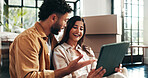 Mortgage, renovation and tablet with couple in living room of new home together for property investment. Boxes, love or planning with man and woman in apartment for bonding, growth or real estate