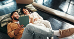 Couple, relax and talk on tablet in new home with relocation, interior design and online shopping. Above, people and discussion with digital app, furniture search and decision for renovation planning