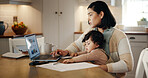 Multitasking, child and mom with laptop, remote work and editing article in kitchen with baby or online. Serious, writer and woman with toddler in house, screen and person with project for blog