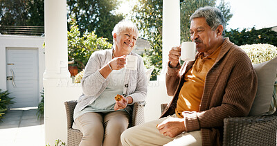 Buy stock photo Outdoor, old couple and breakfast with tea for love, bonding and biscuits while talking in retirement. Porch, woman and man with happiness for relationship, eating and cookies with coffee in morning