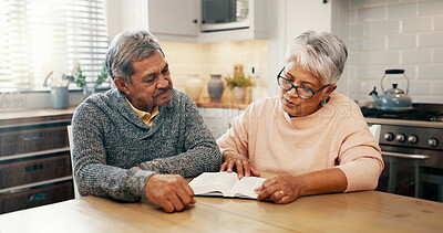 Buy stock photo Senior couple, bible study and reading with religion in home, holding hands and faith with worship in retirement. Elderly man, woman and support for peace, book and praise God with gratitude in house