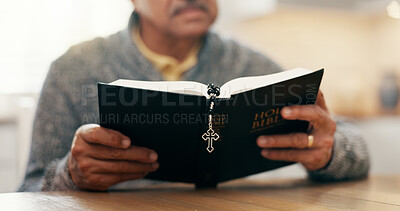 Buy stock photo Reading, religion and bible with hands of person for worship, spiritual study or Christian prayer. Faith, gospel and inspiration with closeup of man at home for Jesus Christ, catholic and scripture