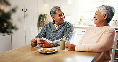 Buy stock photo Bonding, laughing and senior couple with coffee, home and smile with beverage in kitchen and elderly people. Happy, old man and mature woman with tea in house, relationship and funny joke in morning