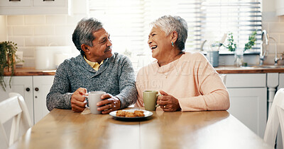 Buy stock photo Kitchen, old couple and breakfast with tea for laughing, bonding and biscuits with talking in retirement. Senior people, woman and man with smile for love, funny joke and cookies with coffee at home