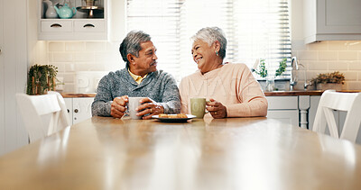 Buy stock photo Kitchen, morning and old couple with tea for laughing, bonding and biscuits for breakfast in retirement. Senior people, woman and man with smile for love, funny joke and cookies with coffee at home