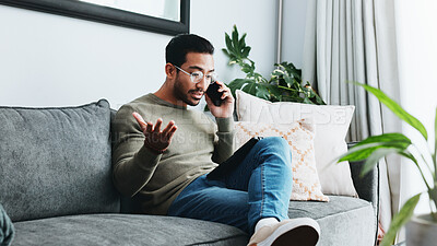 Buy stock photo Phone call, frustrated and man on sofa in home for communication, social networking and chatting. Living room, crisis and person on smartphone for talking, online contact and conversation for issue