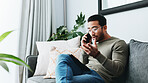 Phone call, conversation and upset man on sofa in home for talking, networking and chat with bad news. Living room, stress and person on smartphone for communication, online contact and connection