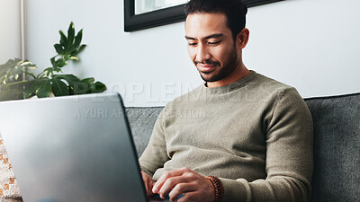 Buy stock photo Research, online and laptop with man on sofa for freelancer, networking and email response. Reading, communication and remote worker with person in living room of home for business proposal or typing