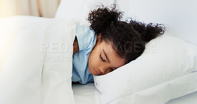 Buy stock photo Sleeping, relax and pillow with girl in bedroom for growth, child development and dreaming. Calm, tired and peace with kid and resting in bed at home for fatigue, comfortable and napping in morning