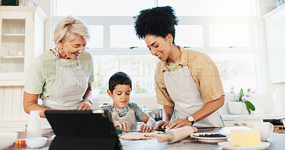 Buy stock photo Tablet, family and women baking with child in kitchen for online cookie recipe, video tutorial or development. Happy mother, grandmother and teaching boy with support, snack preparation and learning