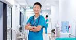 Crossed arms, man and portrait of nurse in hospital with confidence for healthcare career. Happy, pride and face of professional male medical worker in hallway for nursing job with help in clinic.