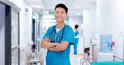 Buy stock photo Crossed arms, man and portrait of nurse in hospital with confidence for healthcare career. Happy, pride and face of professional male medical worker in hallway for nursing job with help in clinic.