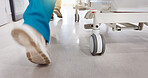 Running, hospital and doctors with stretcher for emergency, surgery or help for medical service. Healthcare, er and feet of team rush with bed for accident, operation or surgical treatment in hallway