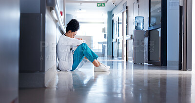 Buy stock photo Doctor, woman and stress on clinic floor for healthcare fail, medical challenge and bad news. Health professional, thinking or grief with hospital loss, mistake and overwhelmed by burnout in corridor