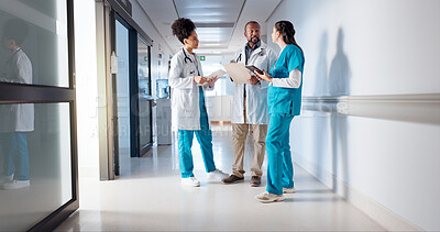Buy stock photo Hospital, discussion and doctors in hallway talking for consulting, patient results and planning. Healthcare, collaboration and men and women with notes for medical service, diagnosis and help