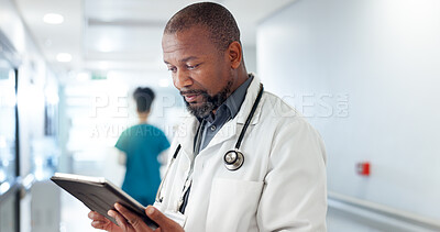 Buy stock photo Man, doctor and tablet in hospital for schedule, wellness research and healthcare checklist. Touchscreen, lobby or surgeon with technology for online information, medical test results or cardiology