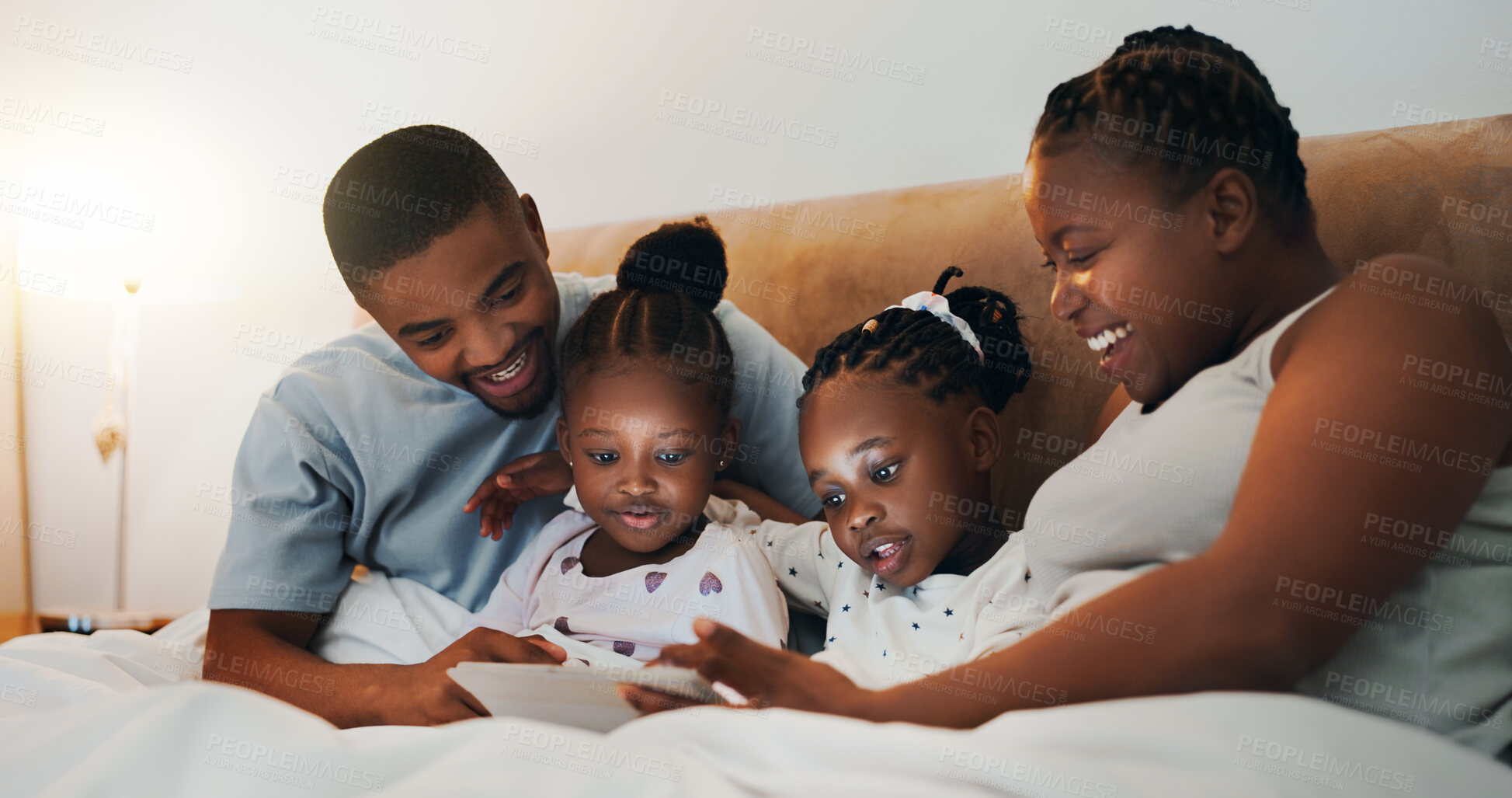 Buy stock photo African family, tablet and happy parents with kids in bedroom, streaming movie or watch cartoon in home. Mother, father and children with technology for relax, show or storytelling with ebook online