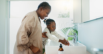 Buy stock photo Hygiene, helping and black mother with child for washing hands in bathroom for learning. Happy, teaching and African mom with girl for cleaning skin for prevention of bacteria, dirt or dust in home.