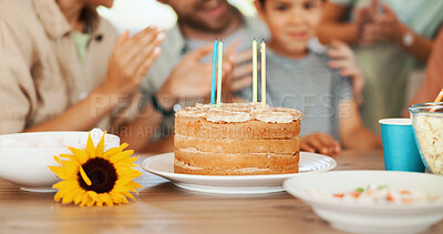 Buy stock photo Birthday cake, food and love with family at home for party, celebration and dining room. Support, dessert and kid with group of people in house for candle, applause and surprise event together