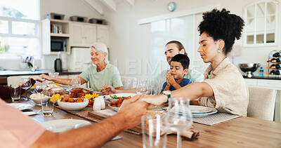 Buy stock photo Prayer, holding hands and lunch with big family in dining room for grace, food and nutrition. Support, worship and grandparents with child and parents eating at home for relax,  religion and health