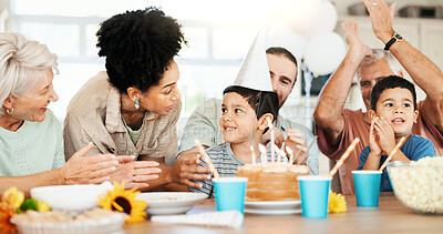 Buy stock photo Birthday, home and parents with children and cake for lunch party, celebration and event together. Family, grandparents and happy boy, mom and dad with dessert, candles and food for surprise in house