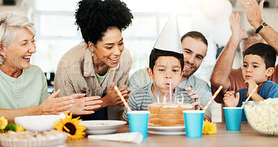 Buy stock photo Clapping, family and child blow birthday cake for cheers, support and love together in house. Kids, candles and dessert to celebrate party with generations and happy parents at special event in home