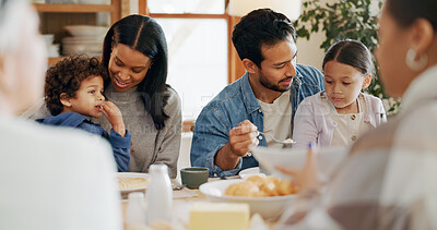 Buy stock photo Breakfast, eating and smile with family at home for bonding, nutrition and croissant food. Morning, wellness and health with parents and kids in dining room of house for connection, support or brunch