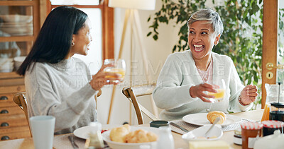 Buy stock photo Breakfast, drink and smile with family at home for bonding, nutrition and food. Morning, wellness and health with senior mother and daughter in dining room of house for connection, support or brunch