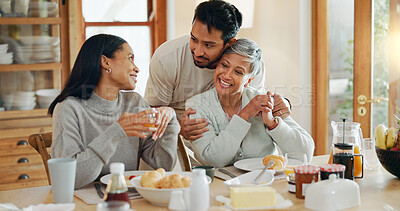 Buy stock photo Breakfast, hug and love with family at home for bonding, nutrition and croissant food. Morning, wellness and health with people eating in dining room of house for connection, support and brunch
