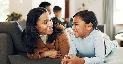Buy stock photo Smile, love and mother with daughter on sofa for bonding, care and comfort together. Support, happiness and couch with woman and child in living room of family home for commitment, relax or growth