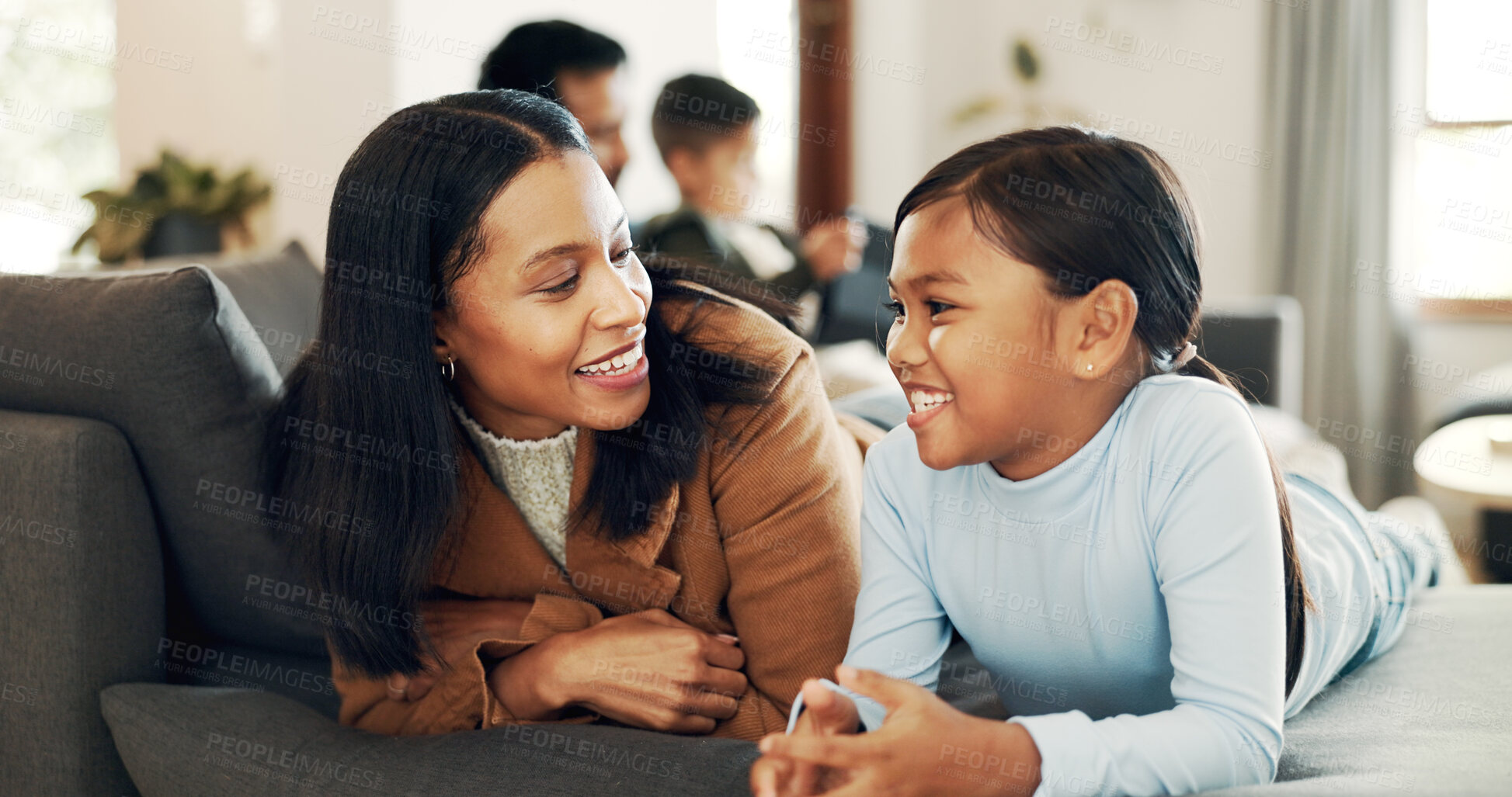 Buy stock photo Smile, love and mother with daughter on sofa for bonding, care and comfort together. Support, happiness and couch with woman and child in living room of family home for commitment, relax or growth