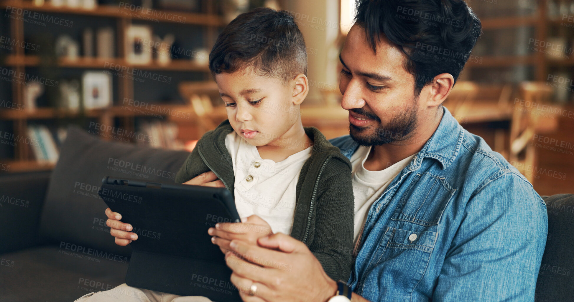 Buy stock photo Home, couch and father with child for tablet, streaming movies and bonding together with technology. House, dad and relax with boy for digital video, cartoon and watch film on website in living room