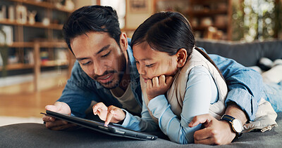 Buy stock photo Home, hug and father with child for tablet, streaming games and bonding together with technology. Sofa, dad and love with girl for digital fun, entertainment and website with support in living room