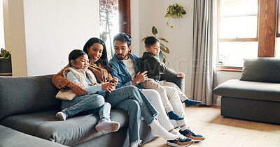 Buy stock photo Relax, watching tv and love with family on sofa for bonding, show and streaming. Movie, happiness and connection with parents and children in living room of home for support, smile or film together