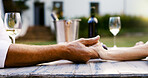 Couple, love and holding hands with champagne at house of romance, partner support and celebration. Closeup, senior people and loyalty of anniversary date, marriage commitment and bonding in backyard