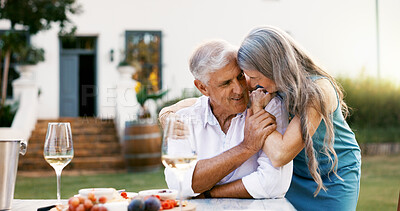 Buy stock photo Date, outdoor and old couple with love, food and bonding together with anniversary celebration. Retirement, senior man or mature woman in backyard, fruit dessert or romance with relationship or smile