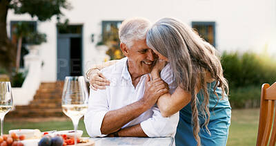 Buy stock photo Date, outdoor or old couple with love, hug or bonding together with anniversary. Retirement, senior man or mature woman in backyard, fruits or romance with relationship, funny or smile with humor