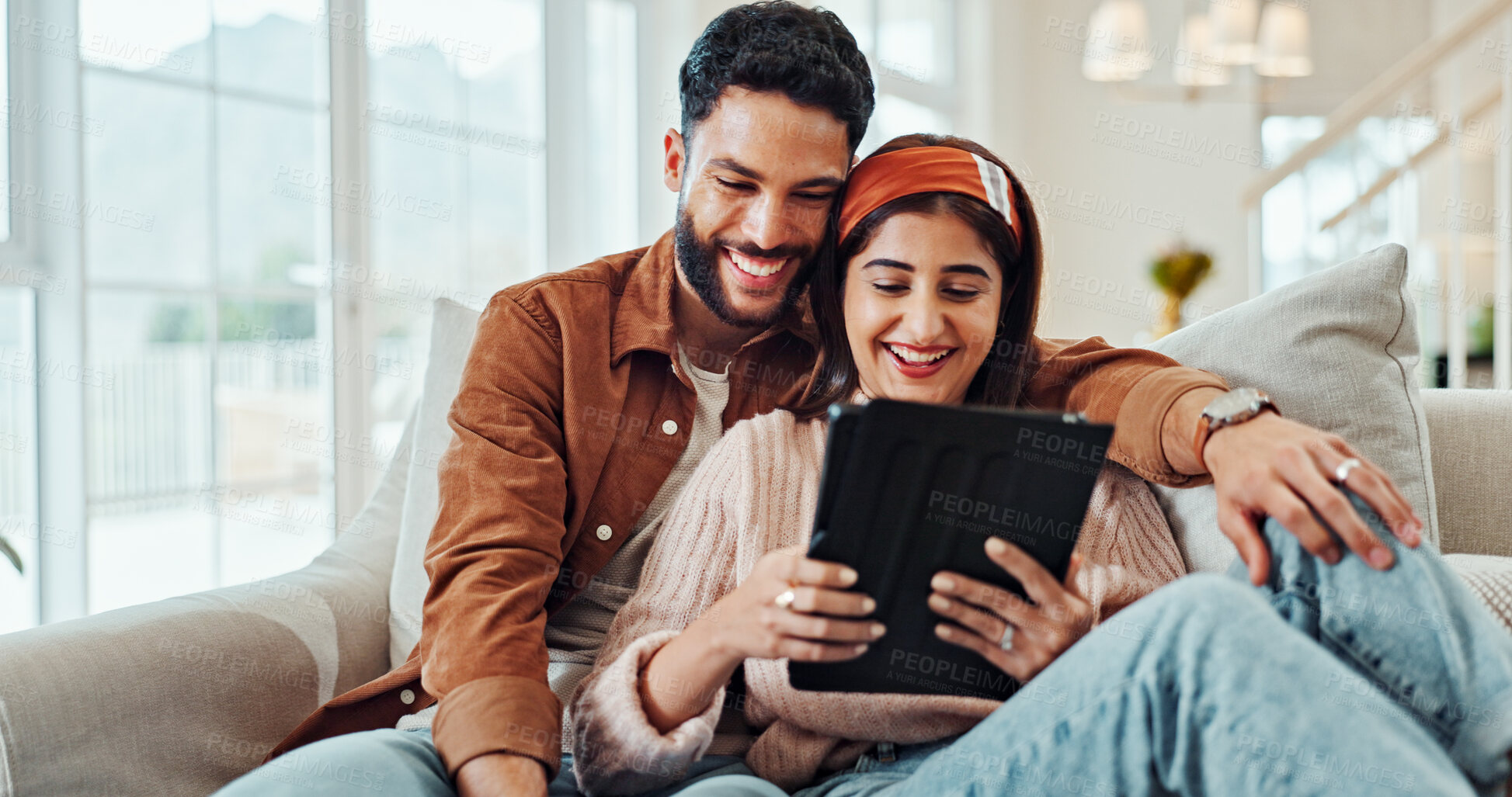 Buy stock photo Bonding, relax and couple with tablet, streaming and subscription to app for entertainment and online. Happy, woman and man with movies in living room, watching and people with tech for date in house