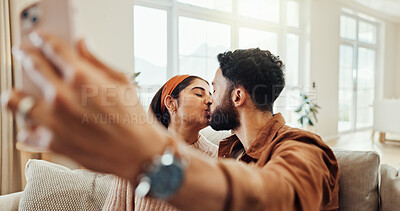 Buy stock photo Couple, relax and kiss with selfie at house of photography, social media post and announcement. People, love and memory with profile picture update, vlog and bonding together for healthy relationship