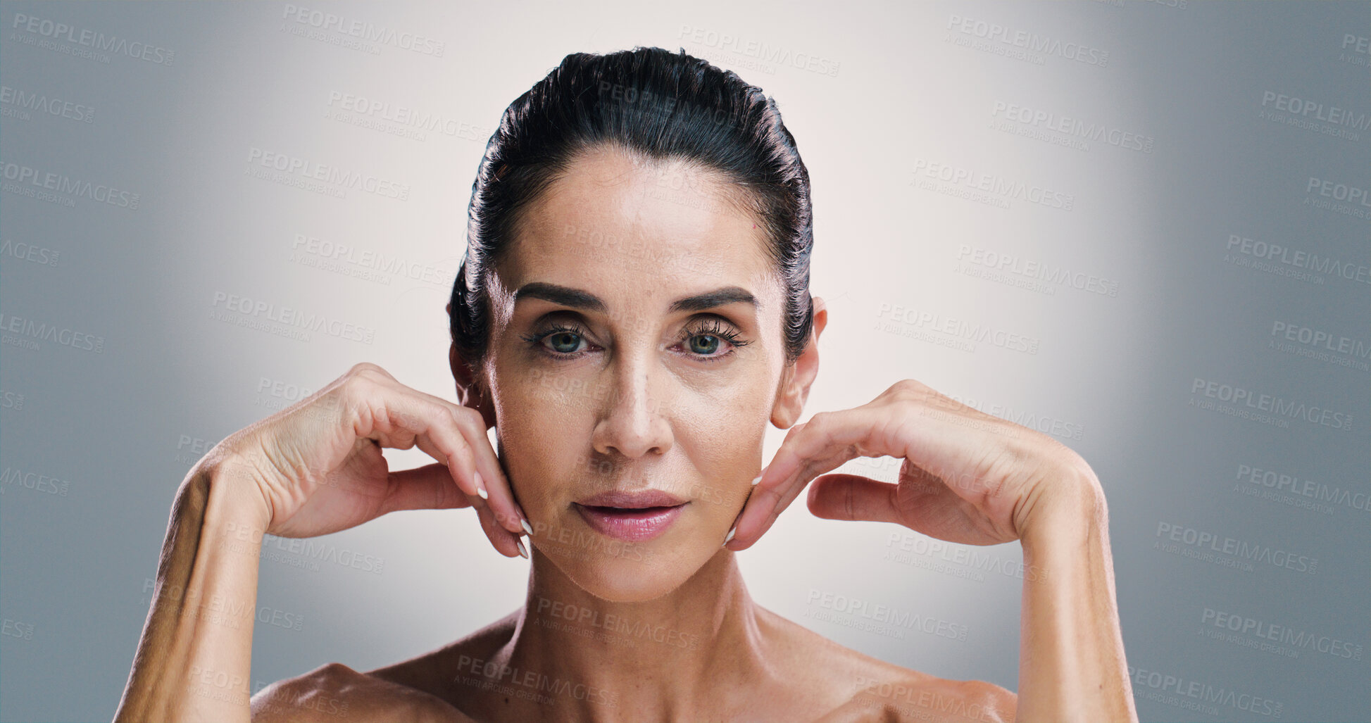 Buy stock photo Dermatology, portrait and skincare with woman in studio for antiaging treatment or wellness routine. Aesthetic, beauty and cosmetics with mature model on gray background for facial transformation