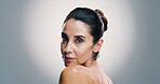 Beauty, portrait and shoulder of woman in studio for antiaging treatment or wellness routine. Cosmetics, dermatology and skincare with confident model on gray background for facial transformation