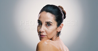 Buy stock photo Beauty, portrait and shoulder of woman in studio for antiaging treatment or wellness routine. Cosmetics, dermatology and skincare with mature model on gray background space for facial transformation