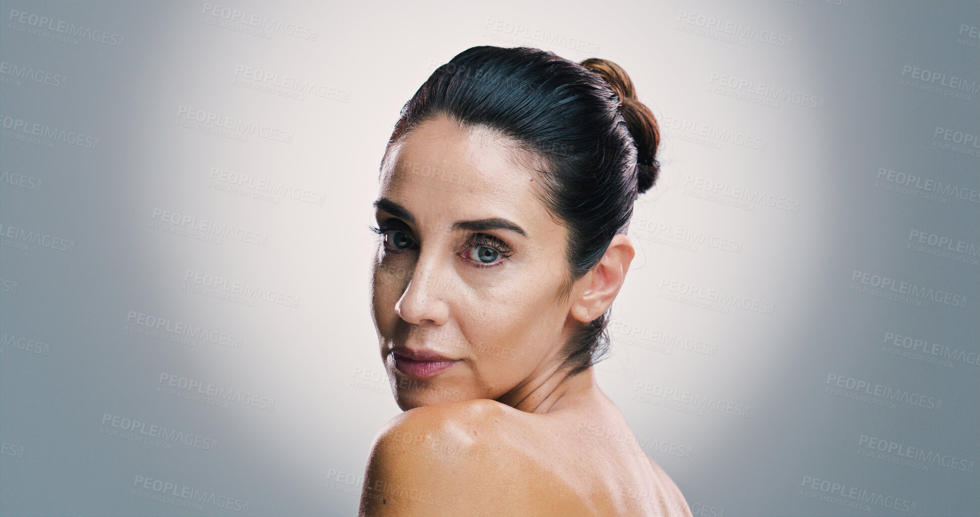 Buy stock photo Beauty, portrait and shoulder of woman in studio for antiaging treatment or wellness routine. Cosmetics, dermatology and skincare with mature model on gray background space for facial transformation