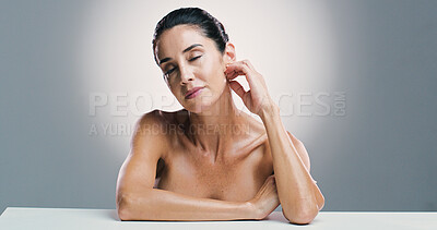 Buy stock photo Beauty, woman and calm skincare in studio with anti aging, treatment and dermatology shine. Mature person, confident and facial transformation, natural glow and cosmetic benefits on white background